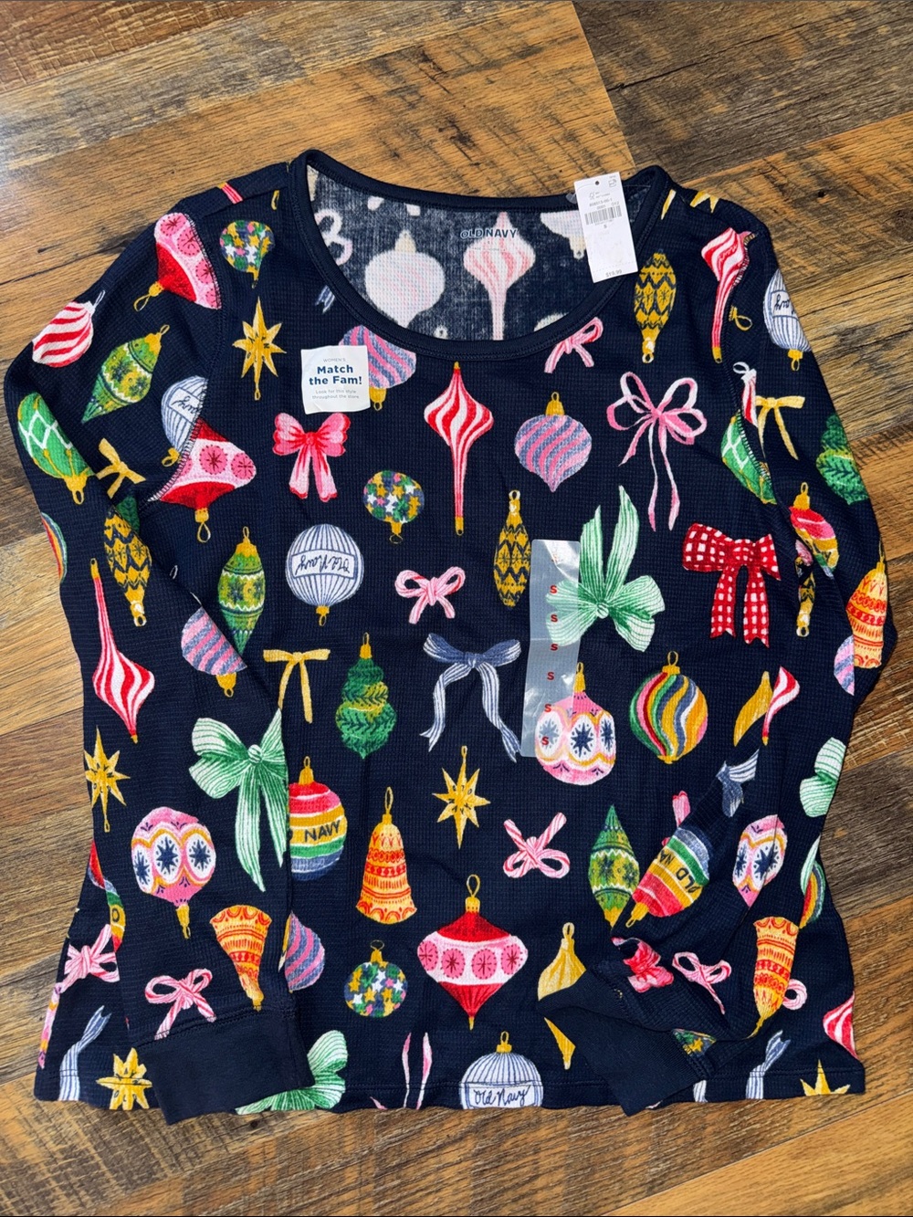 NWT.      Woman’s Christmas pajamas top